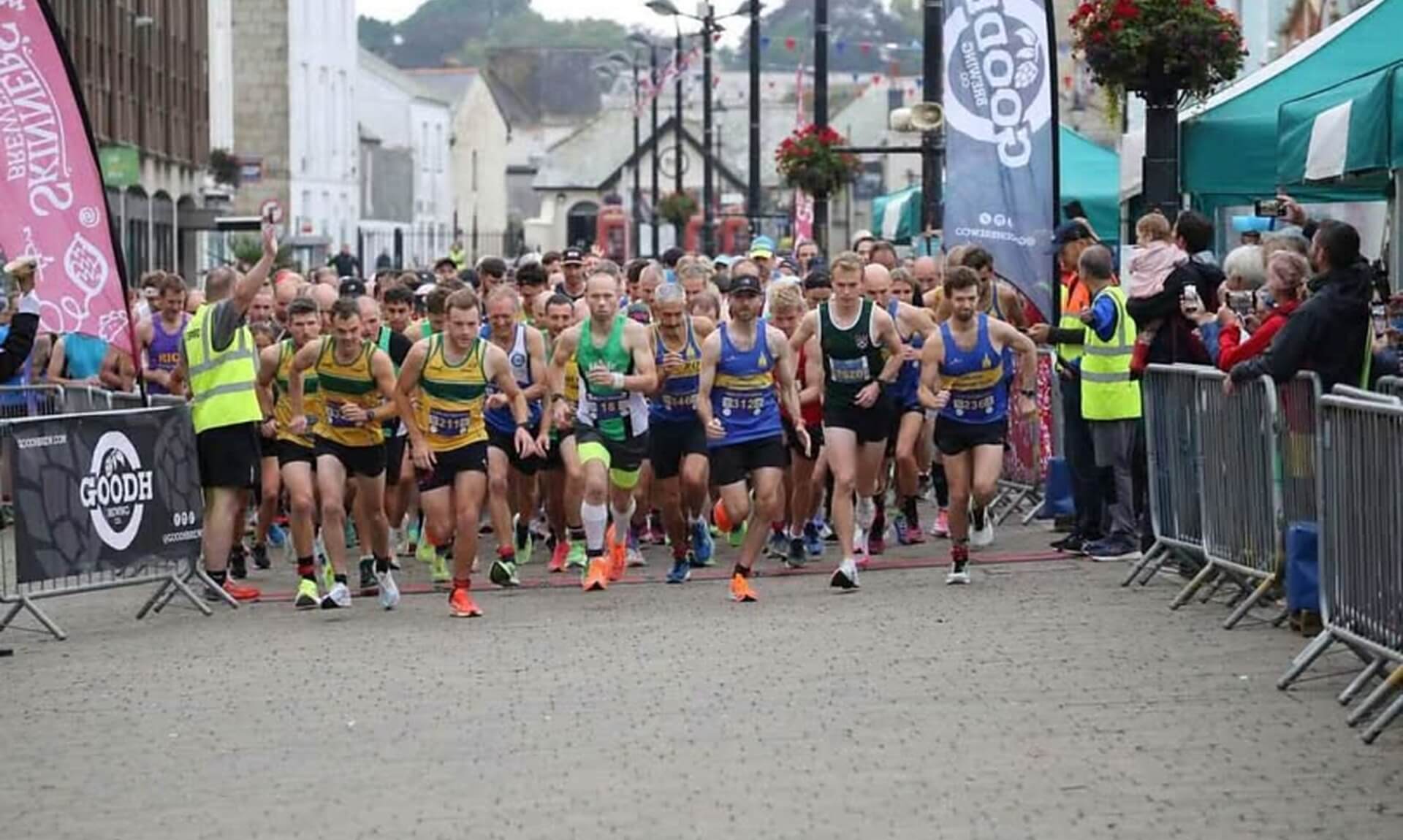 Runners setting off at the start of the Truro Half Marathon on Lemon Quay
