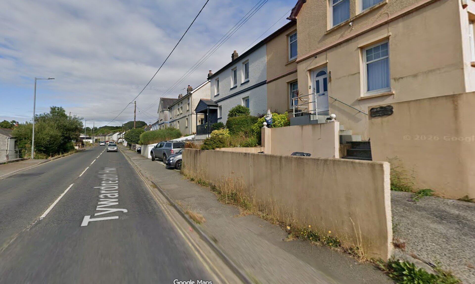Terraced houses beside the road at Tywardreath Highway