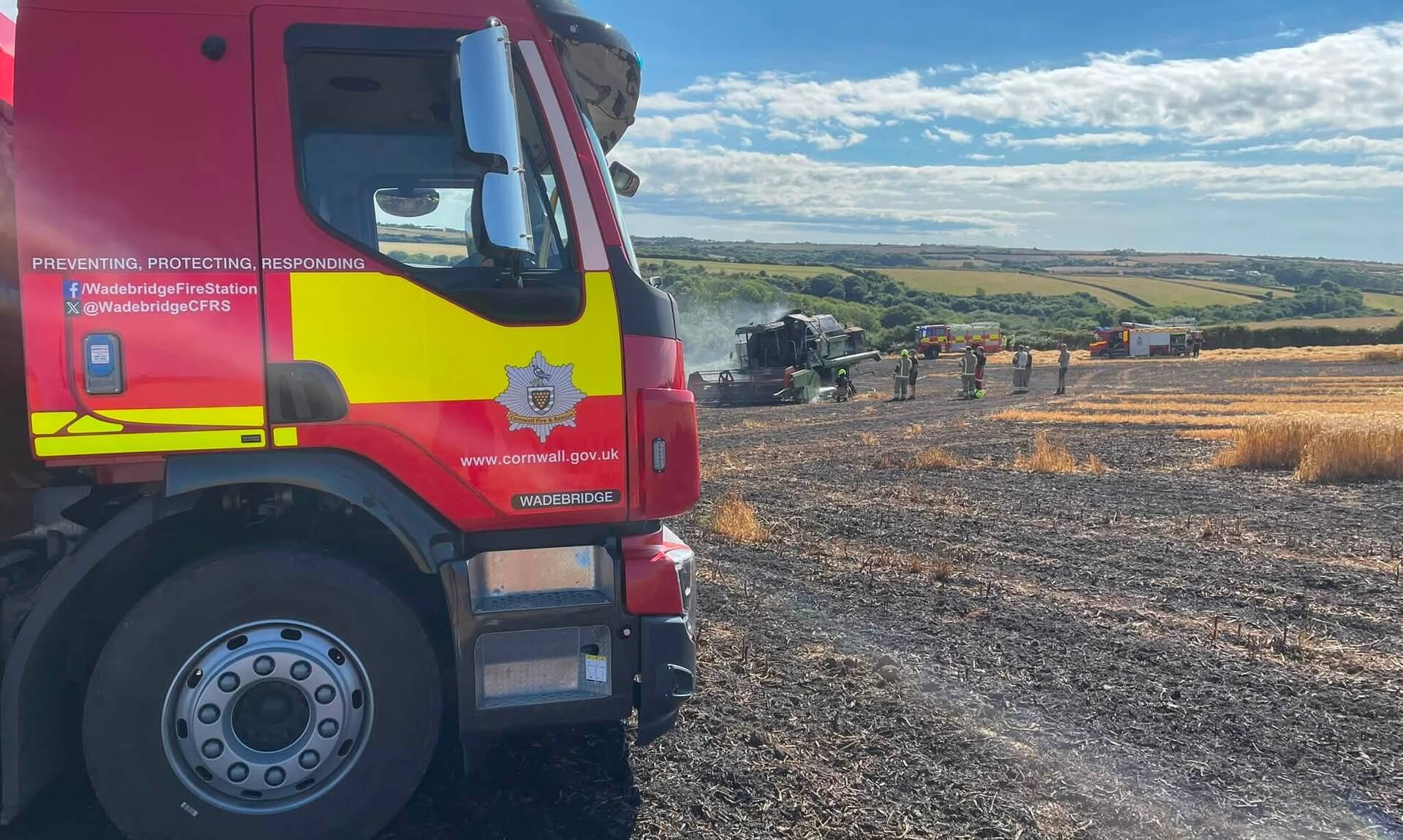 Wadebridge fire engine at the scene of a combine harvester fire