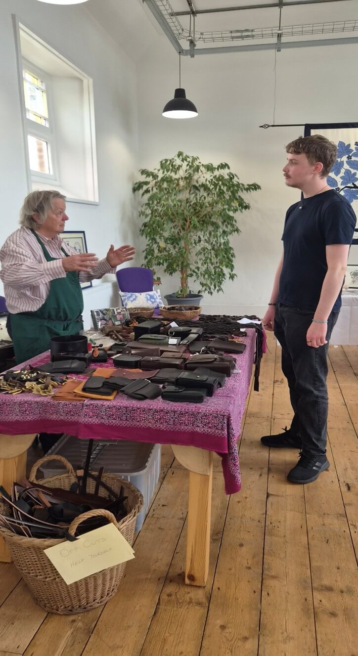 Jane Talbot-Smith demonstrating leather work