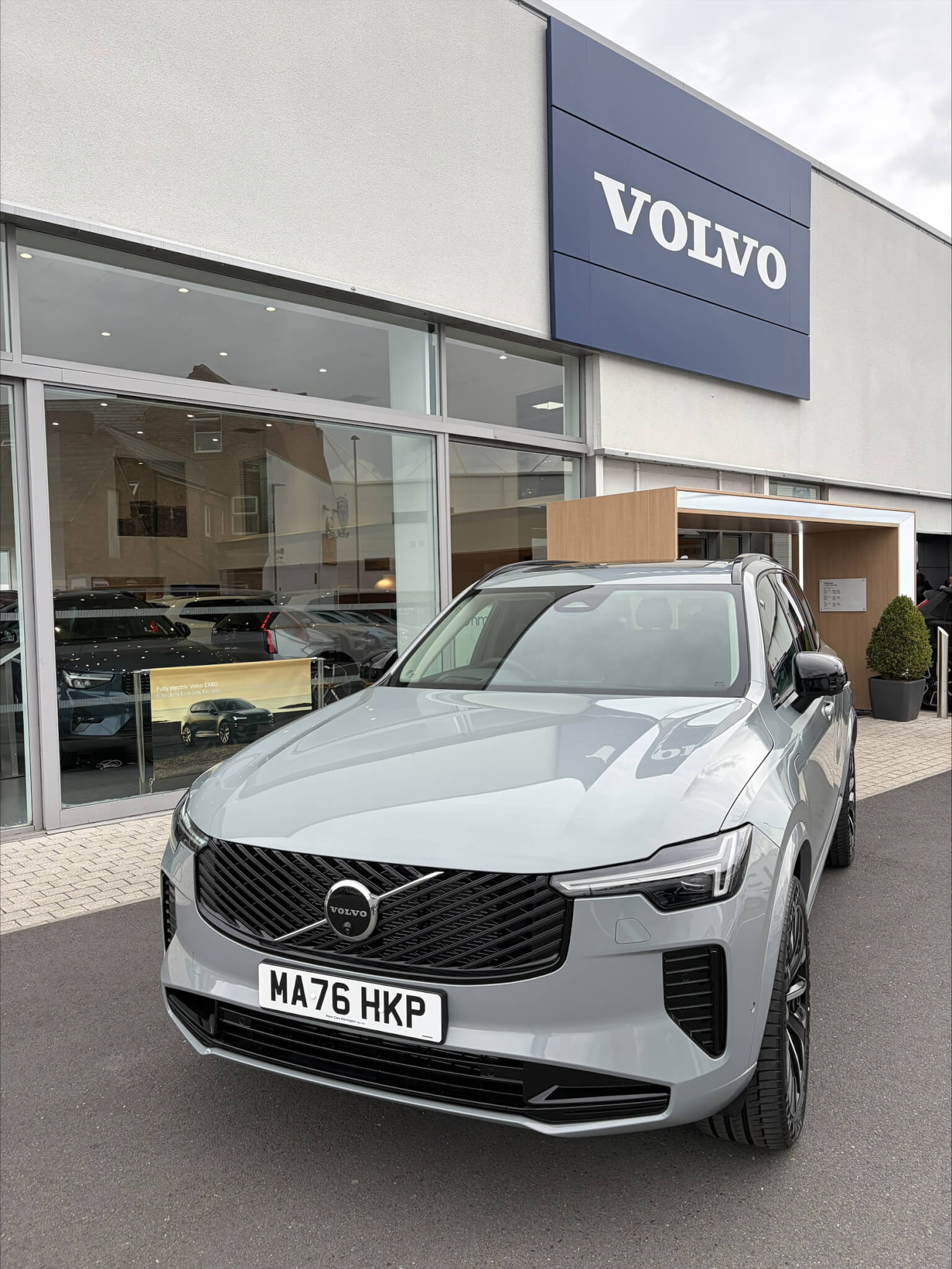 A new Volvo SUV parked outside the Vertu Volvo Truro showroom