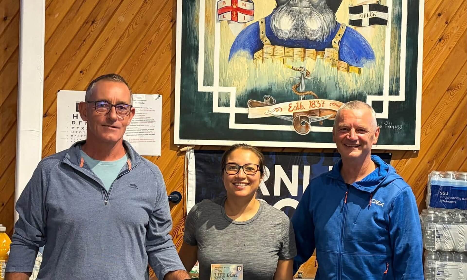 Rhiannon, Mike and Ray, the newest shore crew volunteers at RNLI Bude Lifeboat Station