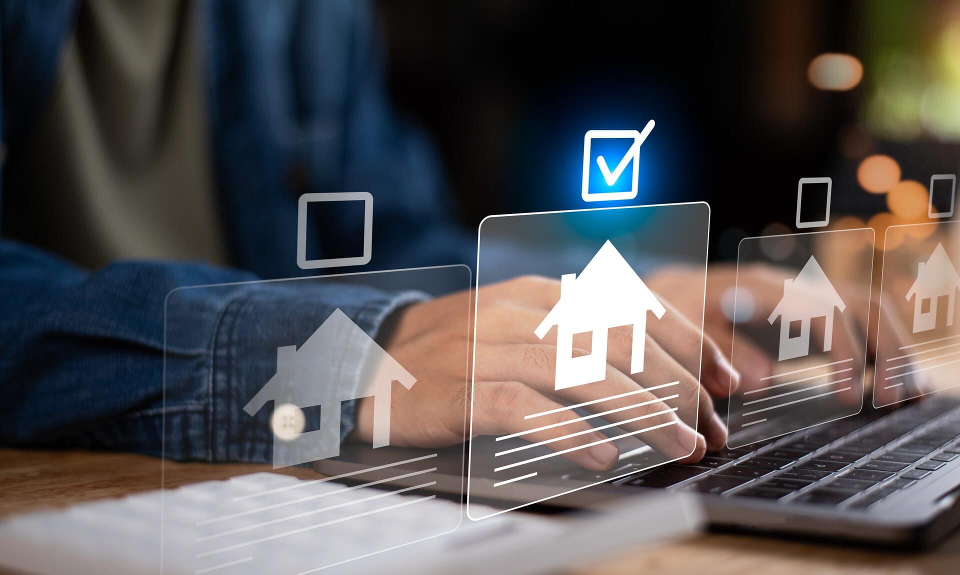 Hands typing on a laptop with digital housing application icons overlaid