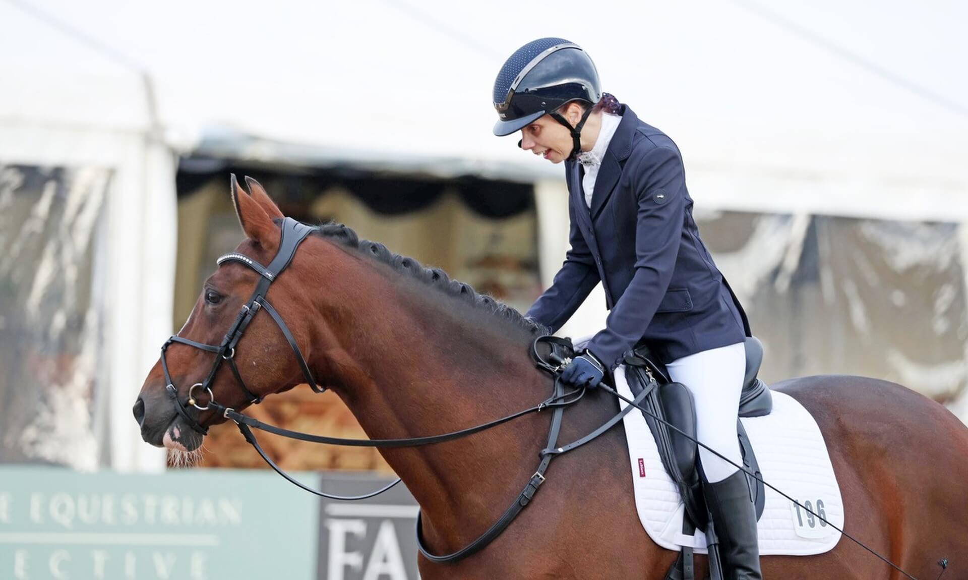 Flis Marriott riding Seran in a dressage arena