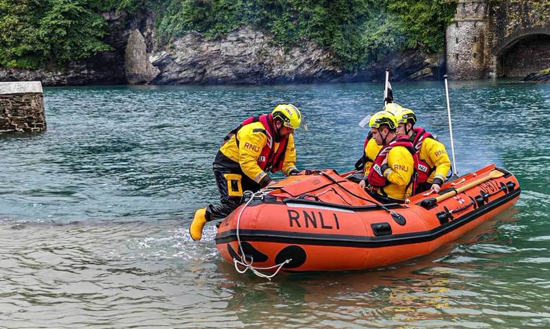 RNLI crew preparing to launch the D Class inshore lifeboat Ollie Naismith II