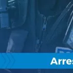 Devon and Cornwall Police officer's uniform with body-worn camera and Arrest banner