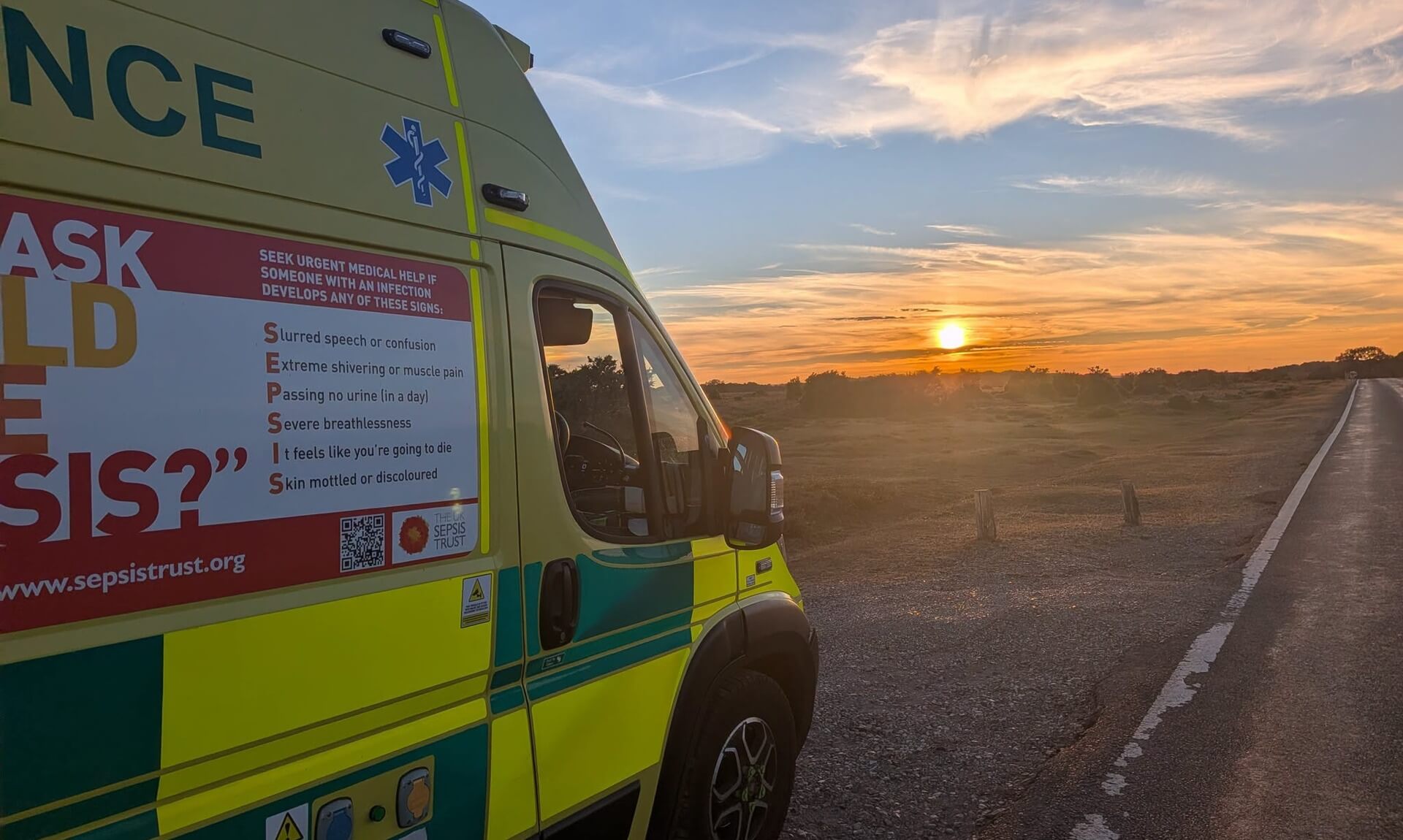 South Western Ambulance Service vehicle at sunset