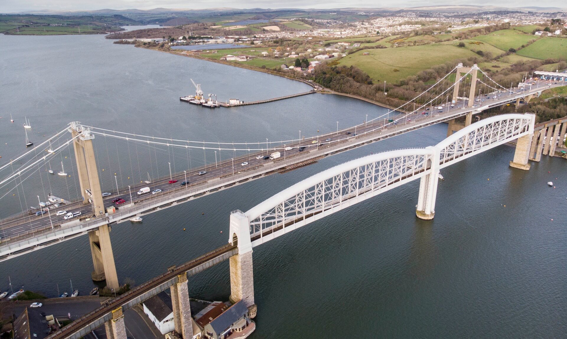 Aerial view of the Tamar Bridge and Royal Albert Bridge crossing the River Tamar