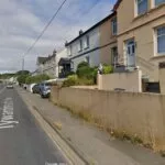 Terraced houses beside the road at Tywardreath Highway