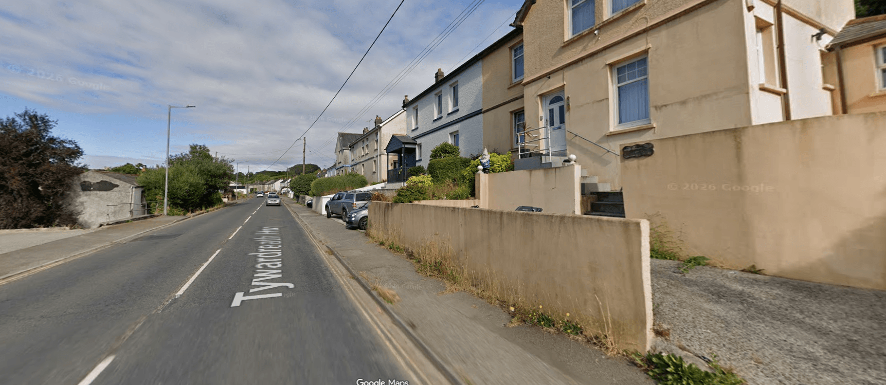 Terraced houses beside the road at Tywardreath Highway