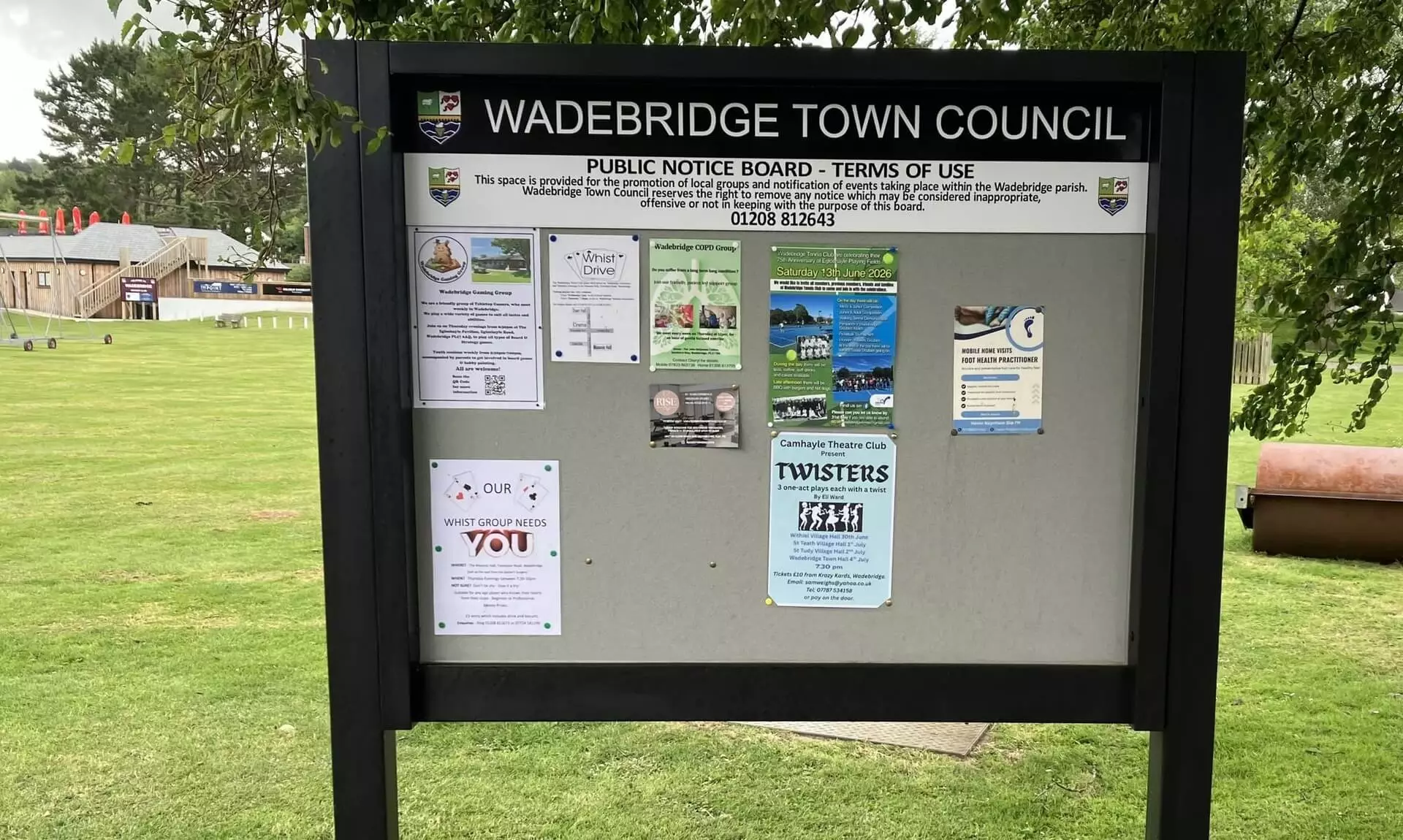 Wadebridge Town Council public noticeboard at Egloshayle Park covered in local posters
