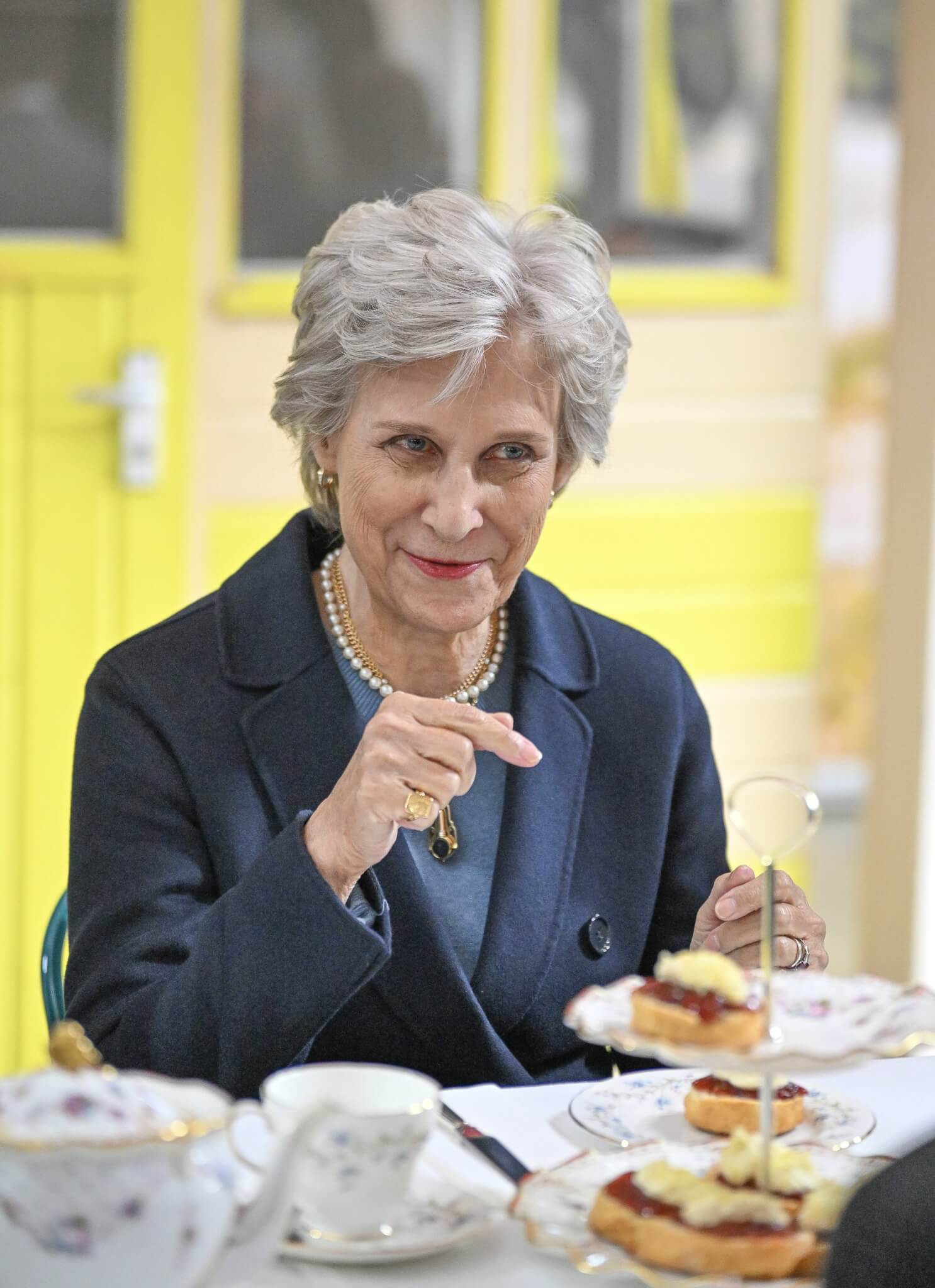 HRH The Duchess of Gloucester at a cream tea during the visit to Rodda's