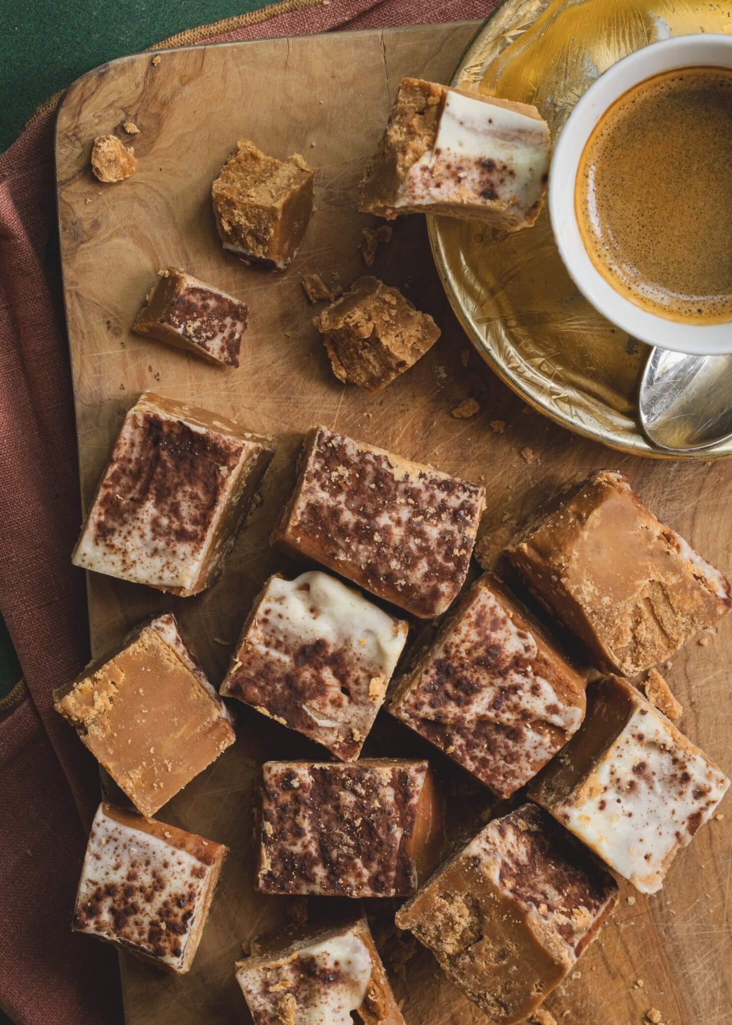 Tiramisu Fudge on a wooden board with an espresso