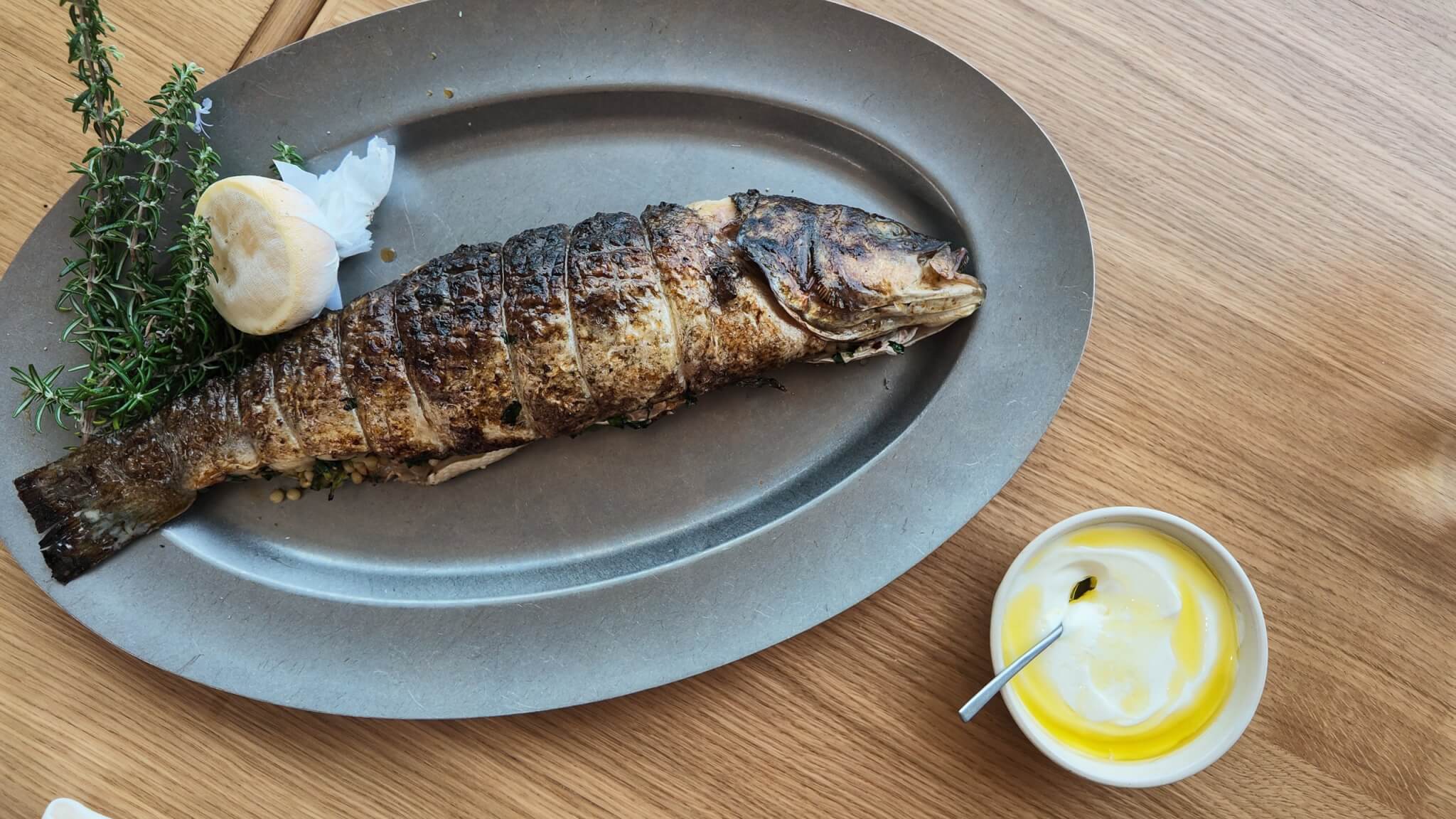 Stuffed market fish on a pewter platter with tahini yoghurt at MOR, Carbis Bay