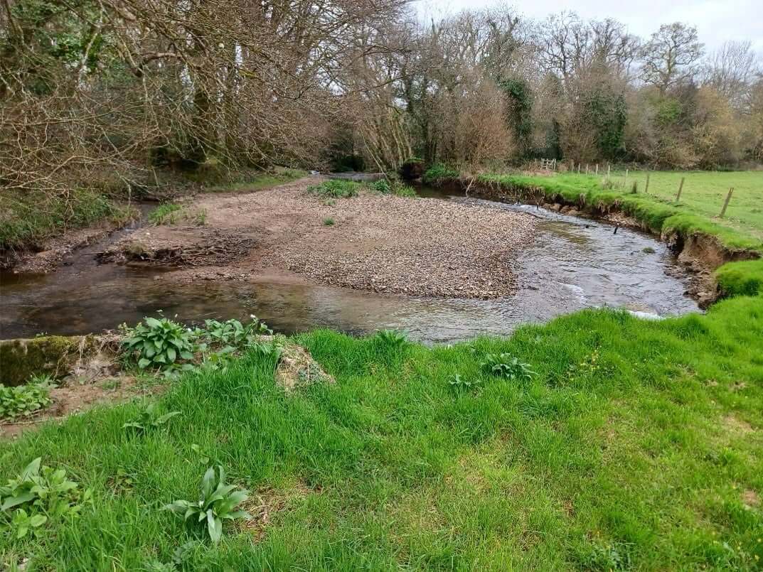 Bend of the Lower River Ruthern with an eroded bank before restoration