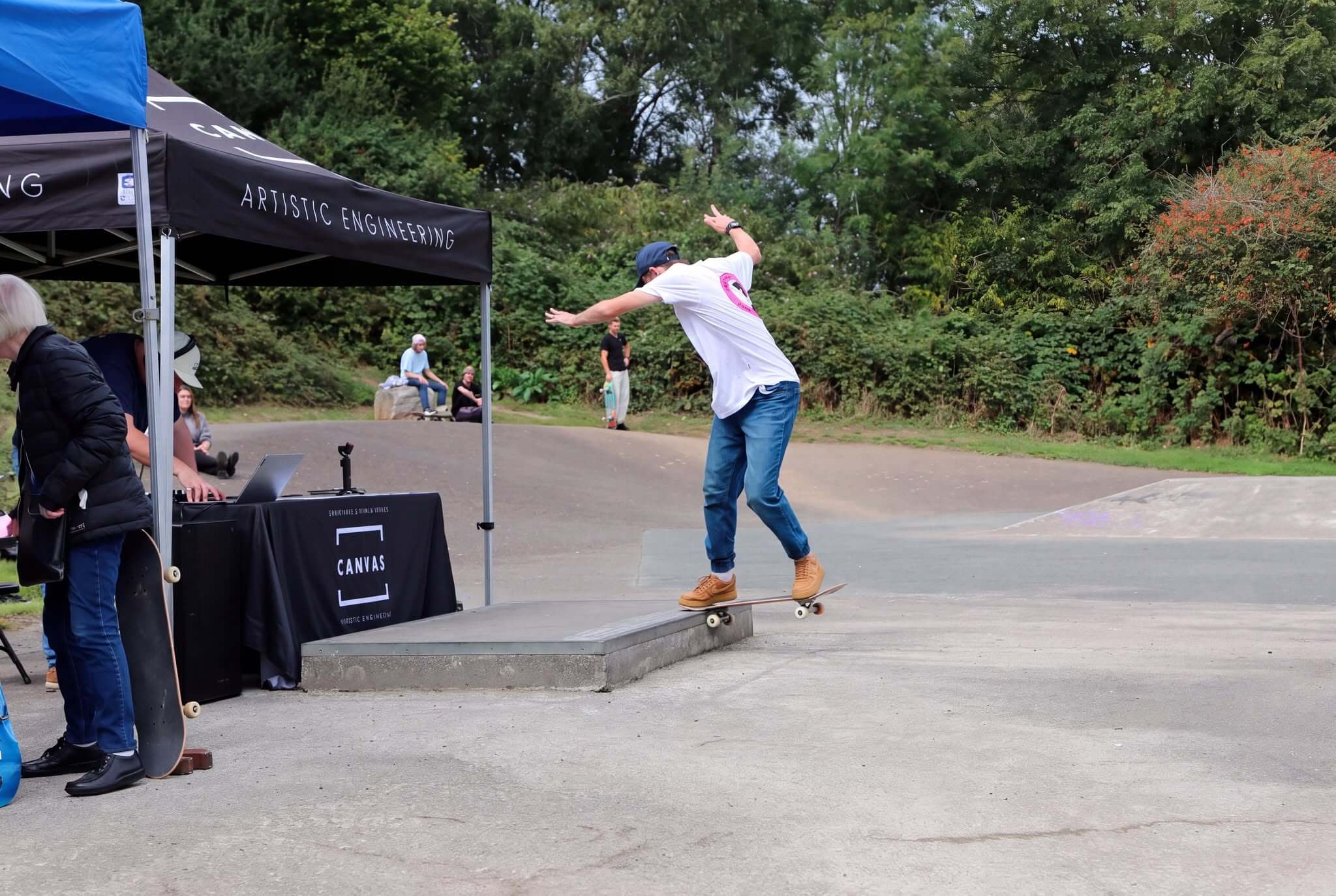 A skateboarder at Torpoint skatepark beside the Canvas Spaces gazebo