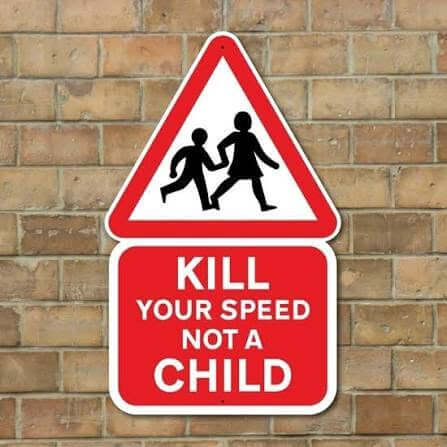 Road sign reading Kill your speed not a child