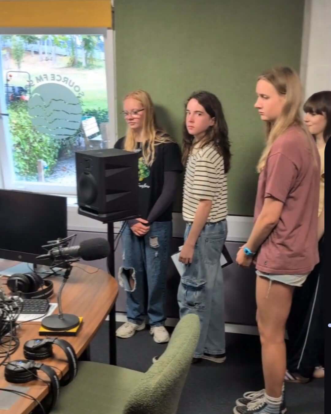 Falmouth youth councillors standing in the Source FM studio