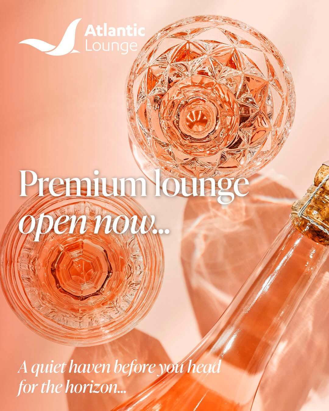 Atlantic Lounge promotional image showing glasses and a bottle of rosé at Cornwall Airport Newquay