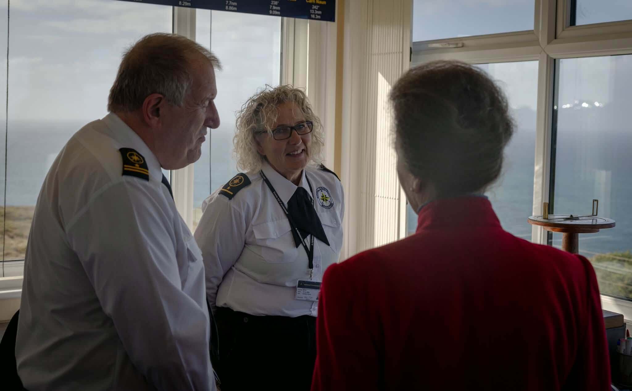 The Princess Royal talking with volunteers inside the lookout