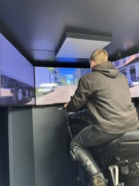 A young rider using the police motorcycle simulator