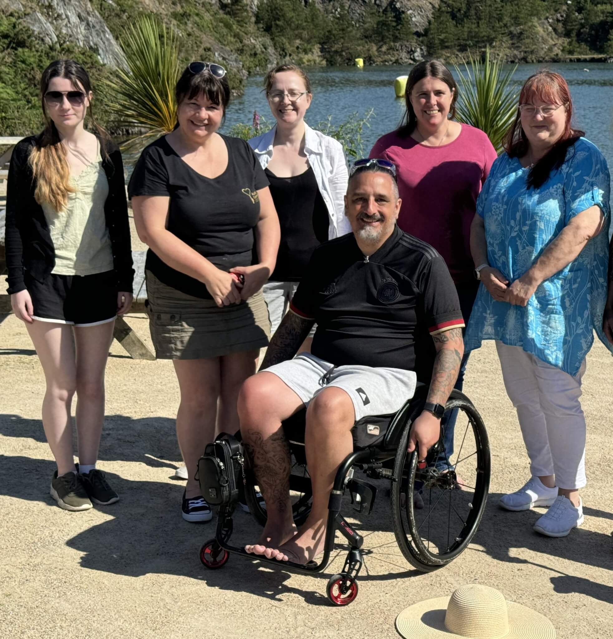 Six members of the Access Cornwall team beside the water