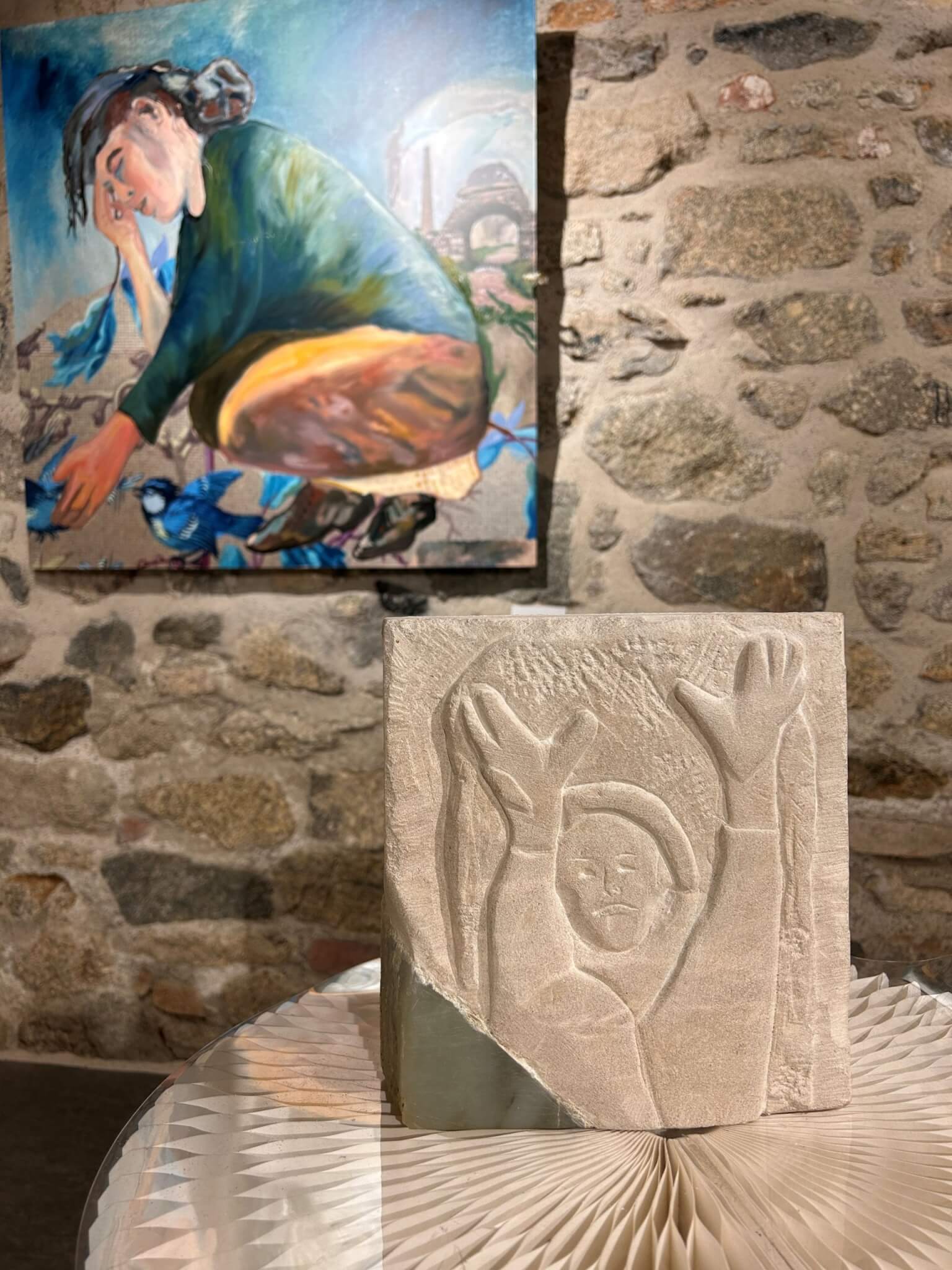 A painting and carved stone relief in Arsenic: What Price Beauty?