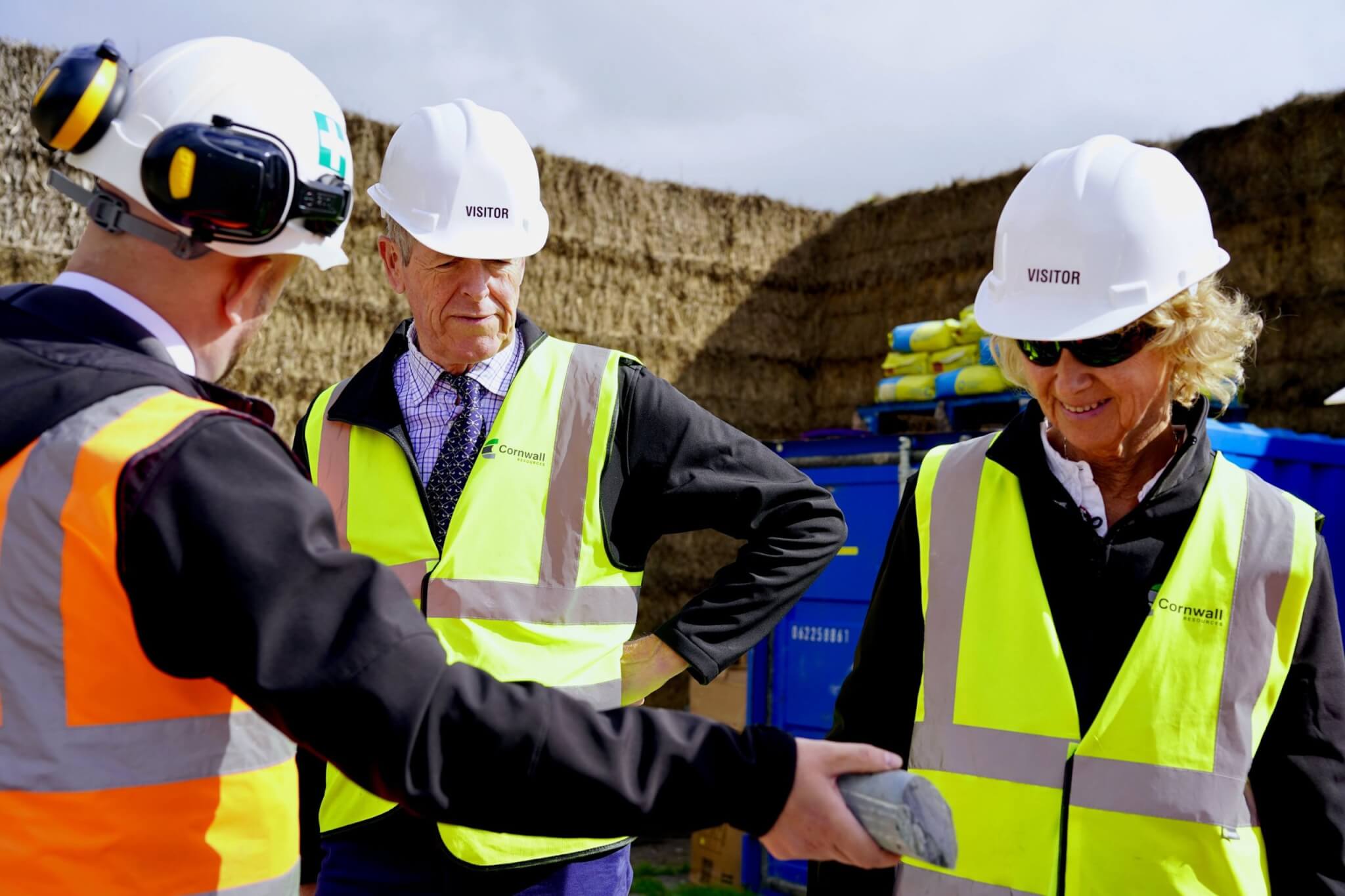 A rock core sample being shown to the Lord-Lieutenant and Deputy Lieutenant Kate Holborow
