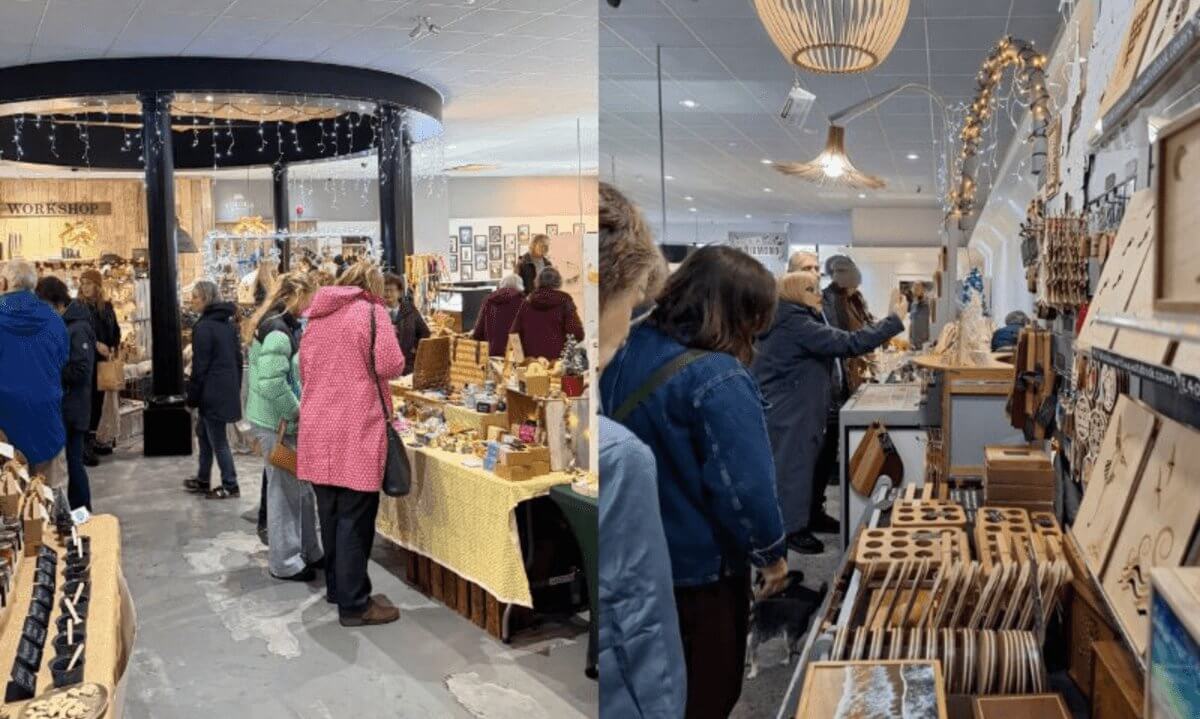 Shoppers browsing stalls at Cornwall Gold's Christmas Market