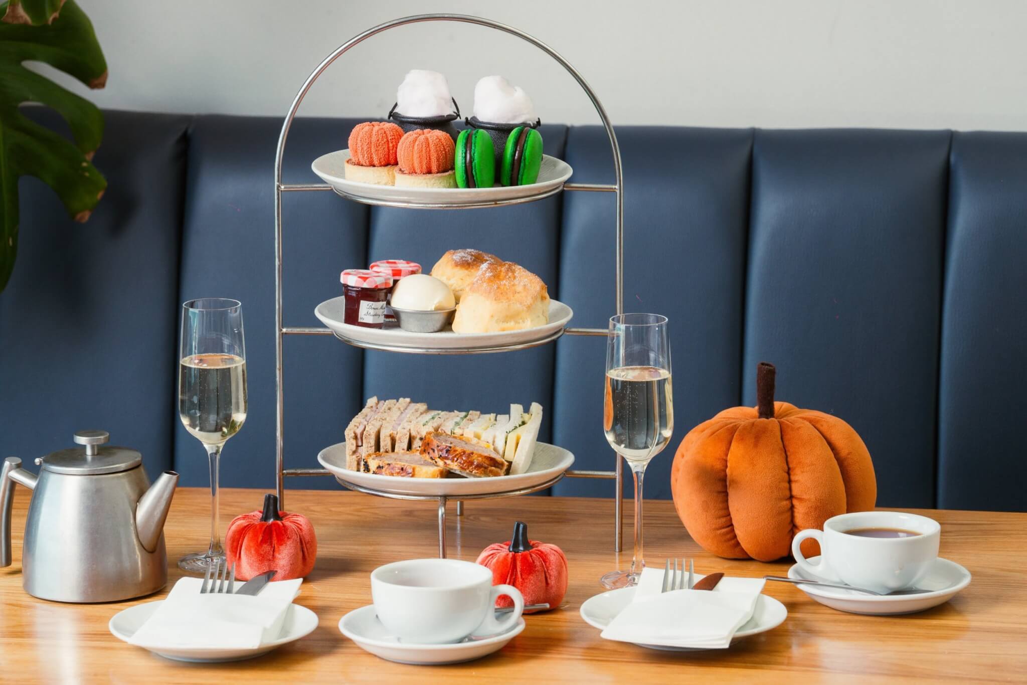 Halloween afternoon tea stand with sparkling wine and a pumpkin at The Esplanade, Newquay