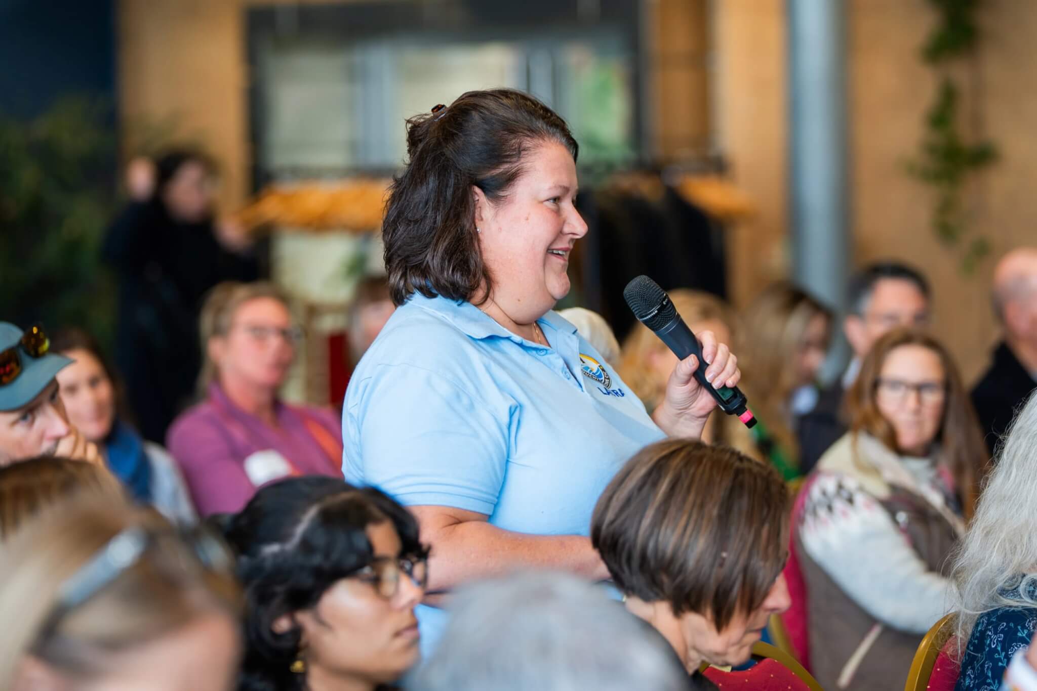 A delegate asks a question at Nature Connected Lives at the Eden Project