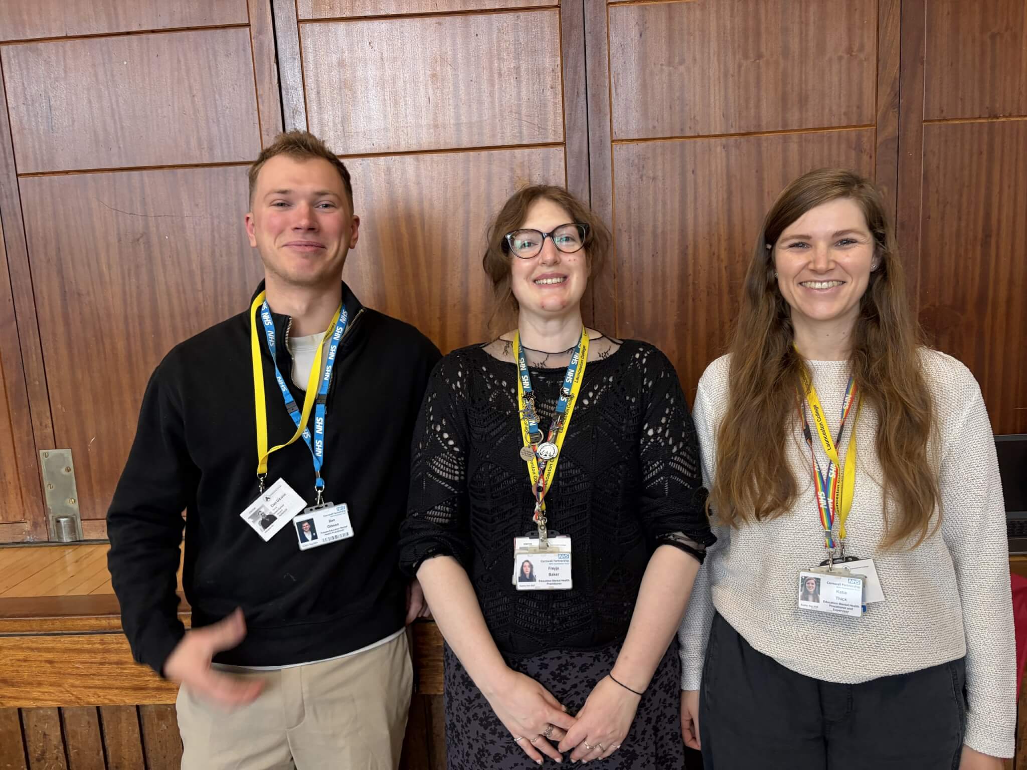 Dan Gibson, Freyja Baker and Katie Thick wearing NHS lanyards at Launceston College