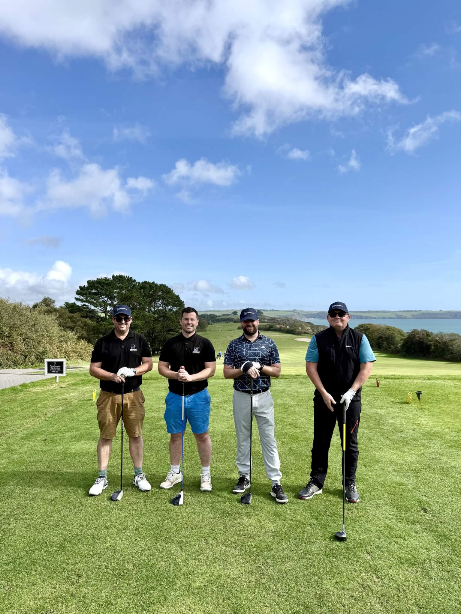 Four golfers on the tee at Carlyon Bay Golf Club during the Hawkins charity golf day
