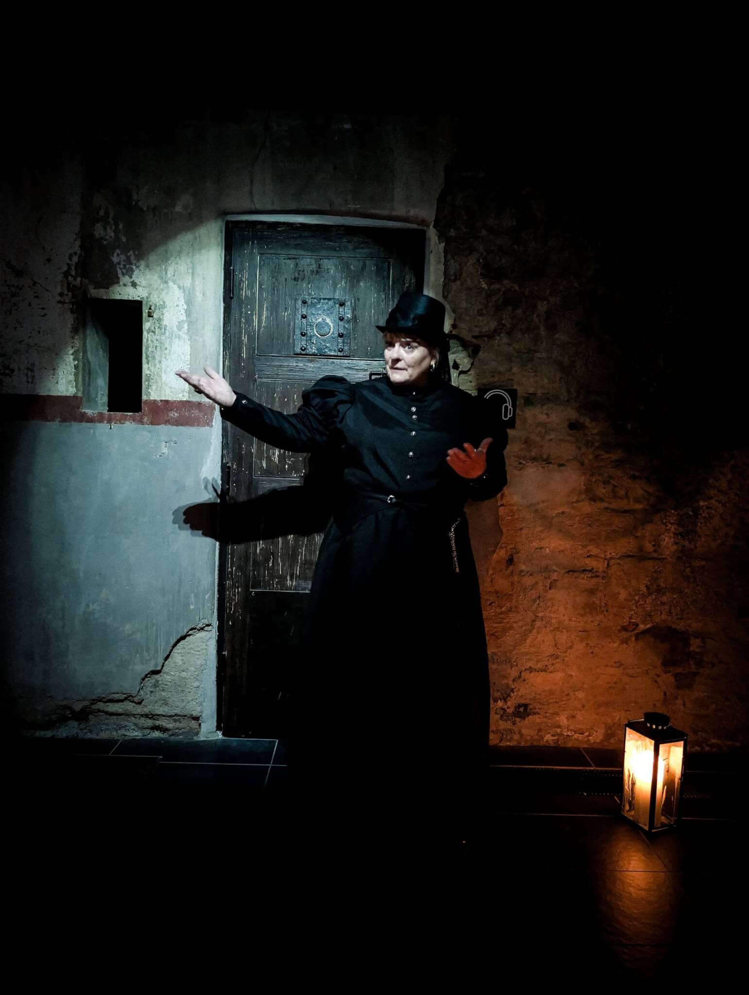 Ghost Walk guide in a cell at Bodmin Jail