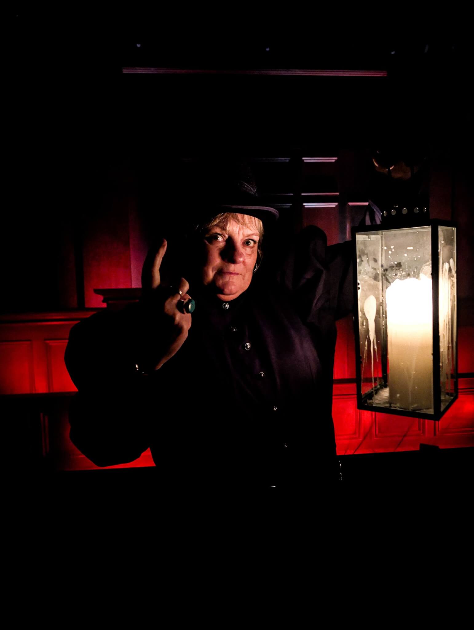 Ghost Walk guide with a lantern at Bodmin Jail