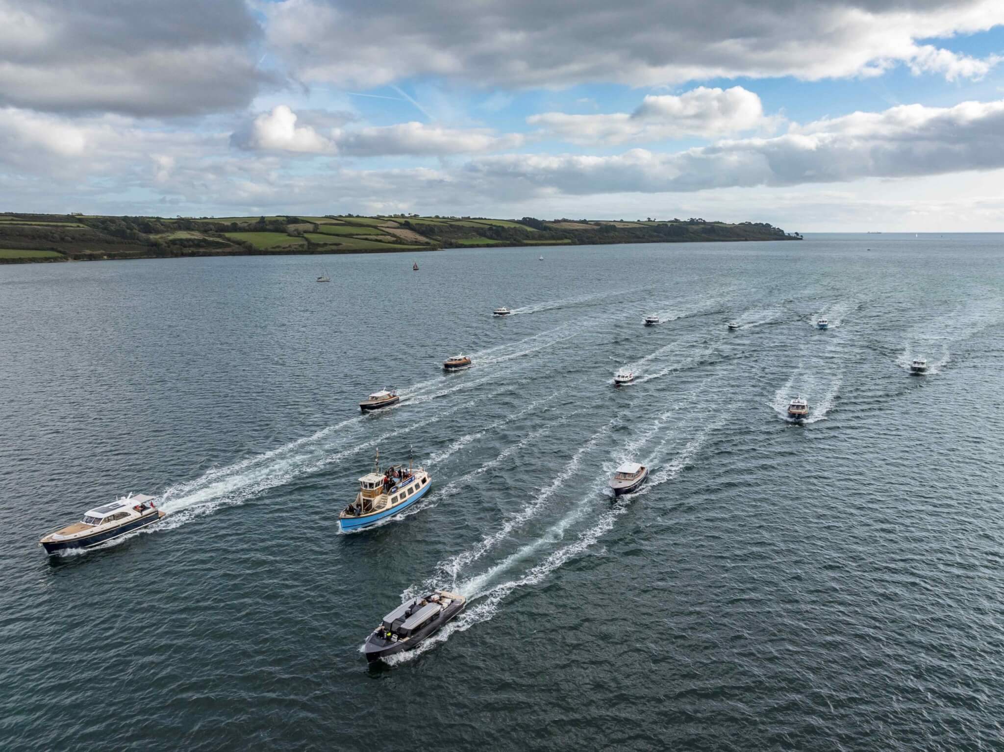 Aerial view of a flotilla of Cockwells boats on the Carrick Roads, Falmouth