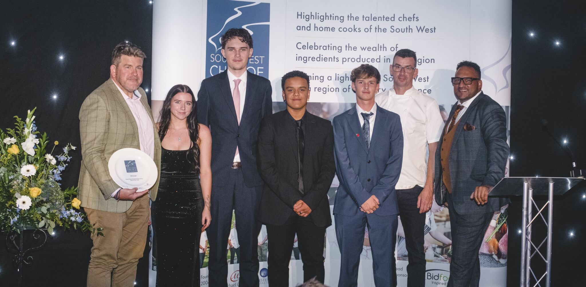 L-R Mike Benfield from Forest Produce, Madison Williams, Josh Goodman, Luca Jokonya, Isaac Harris, Hywel Jones and Michael Caines