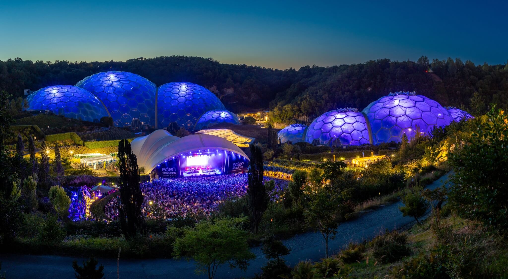 Eden Project Biomes lit up during a Madness gig