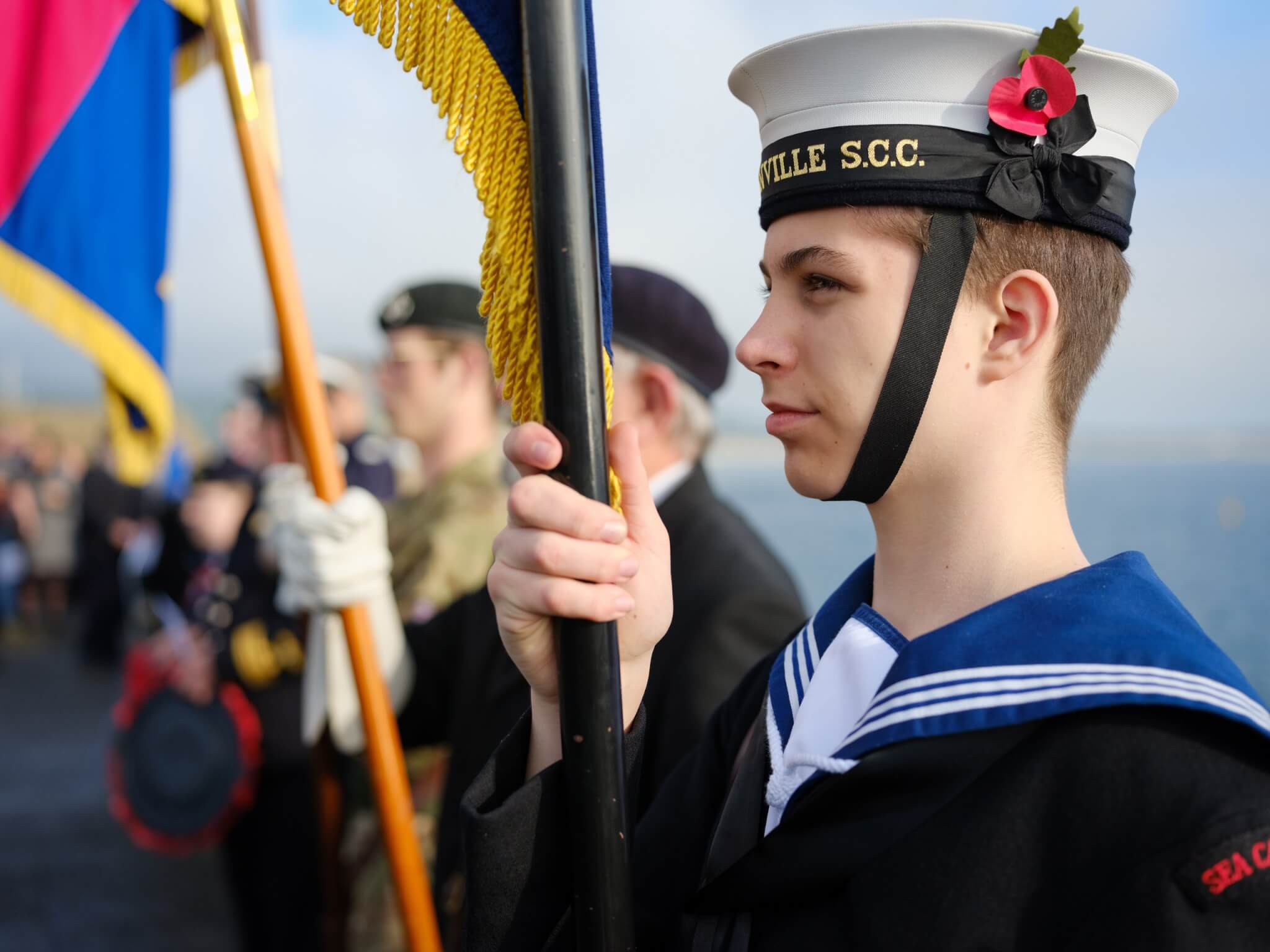 Standard bearer David Mytnik at Remembrance Sunday in Penzance