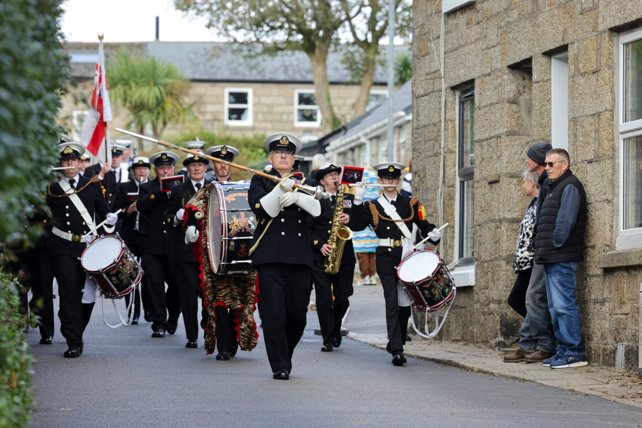 HMS Seahawk Volunteer Band leading the Trafalgar parade through Madron