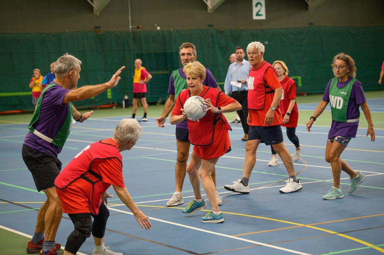 Walking netball match at the Senior Club Games at Bodmin Leisure Centre