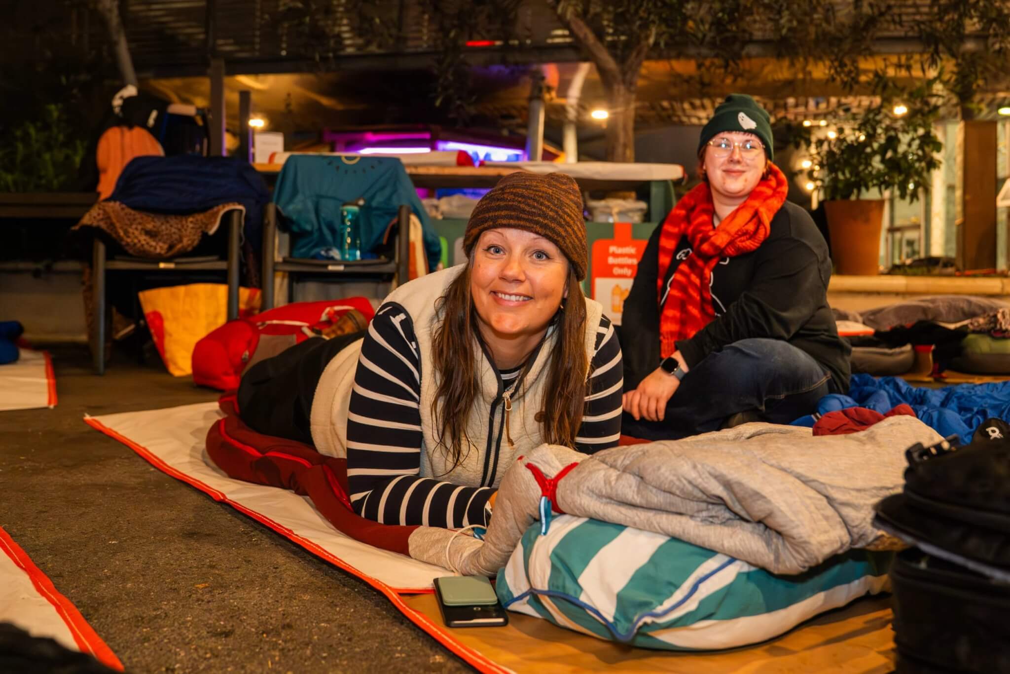 Participants settling into sleeping bags at the Eden Project Sleep Out