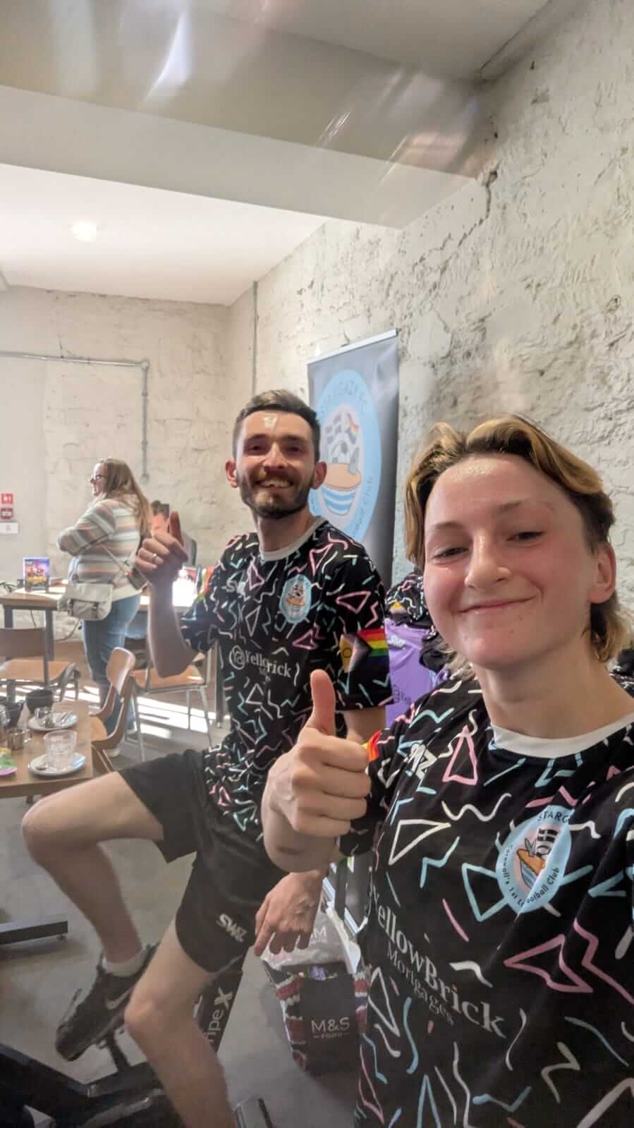 Two Stargazy FC players giving a thumbs up