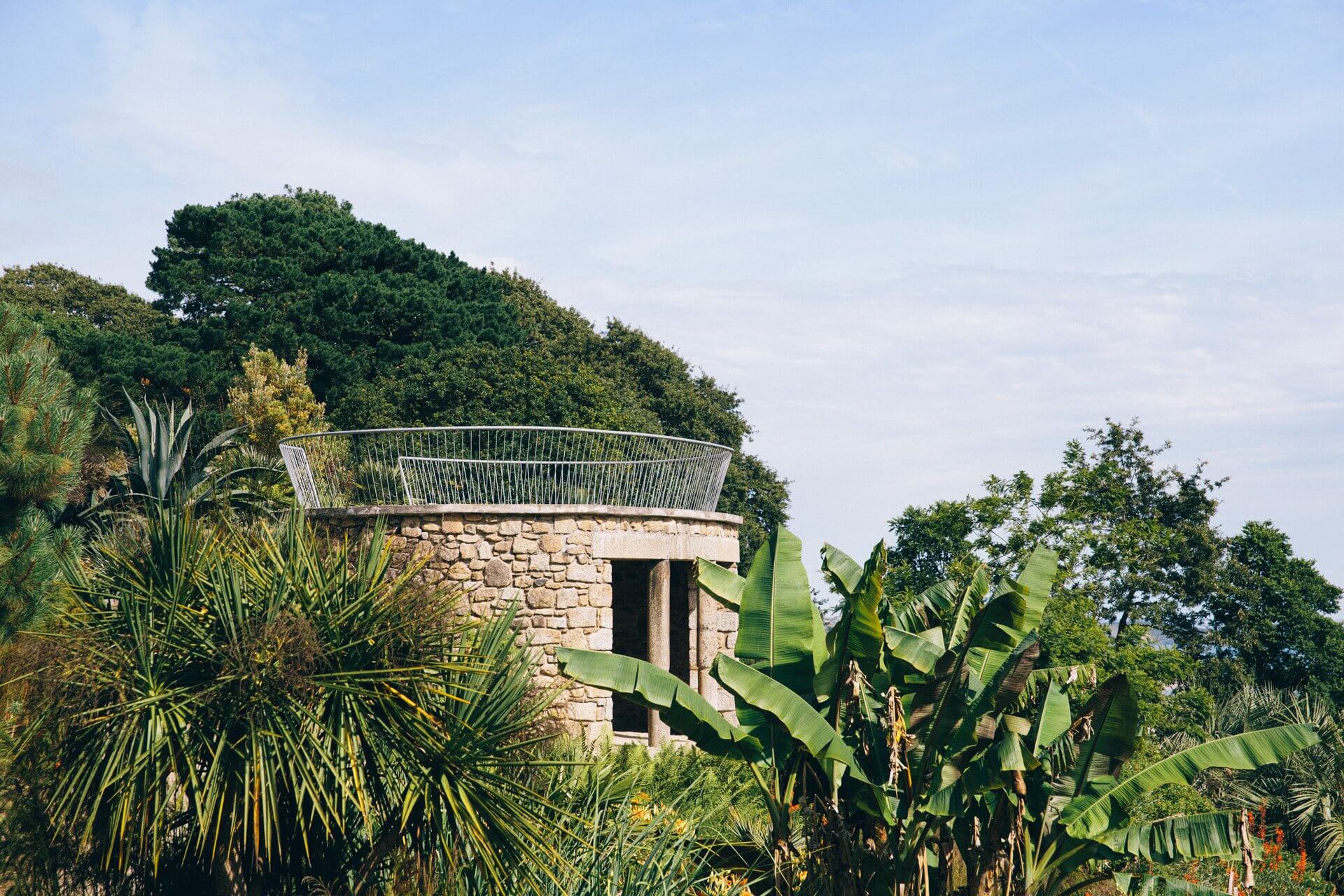 The Pagoda among palms and banana plants at Tremenheere Sculpture Gardens near Penzance