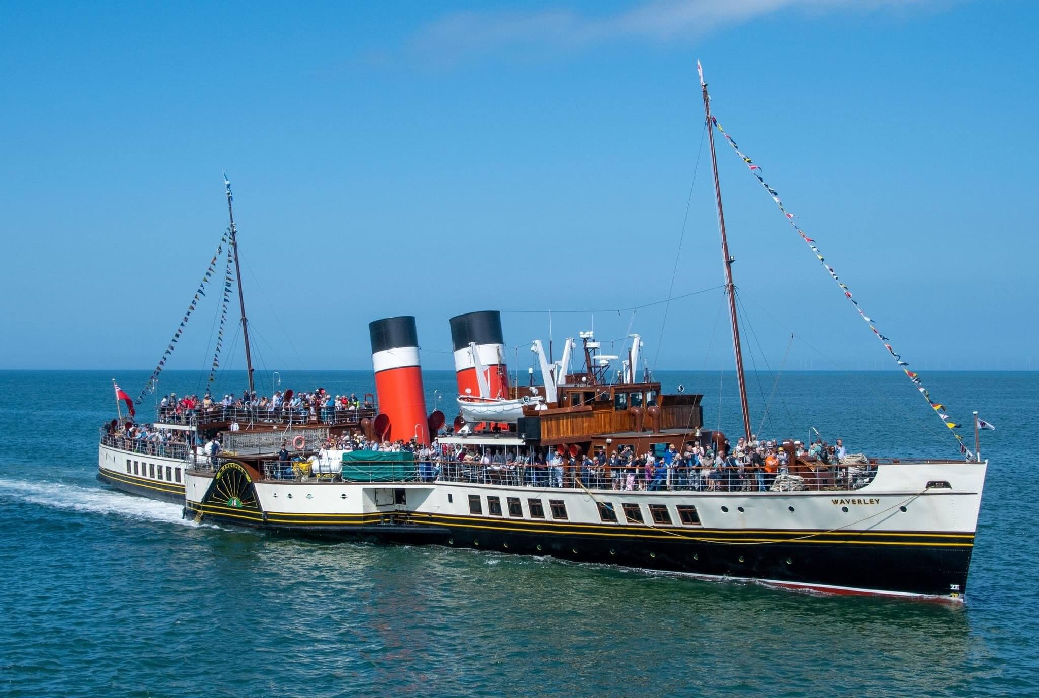Paddle Steamer Waverley at sea with passengers on deck