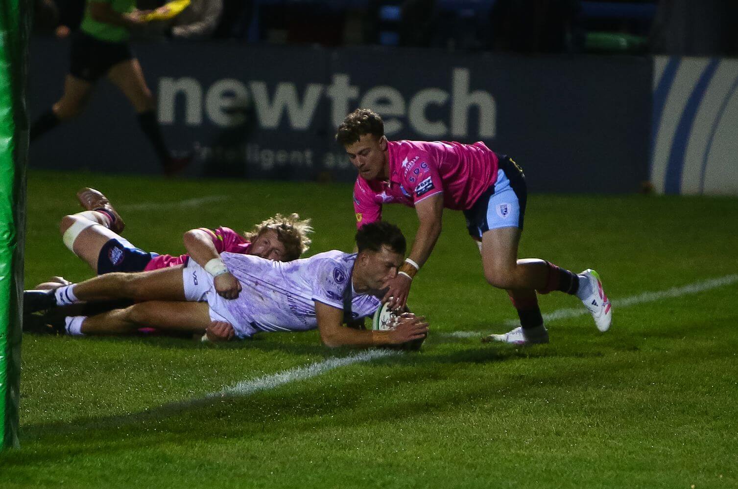 Cornish Pirates wing Arthur Relton dives over to score against Bedford Blues