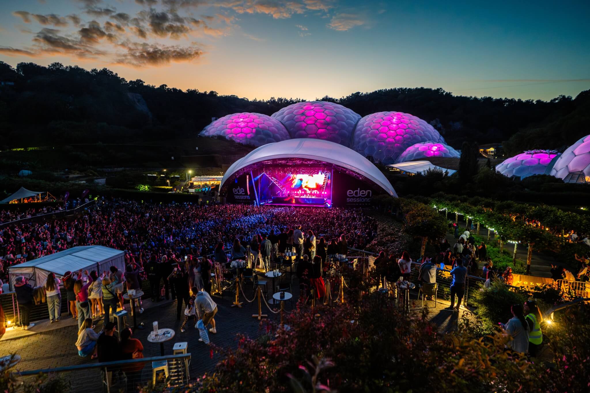 Becky Hill on stage at the Eden Sessions with the Biomes behind