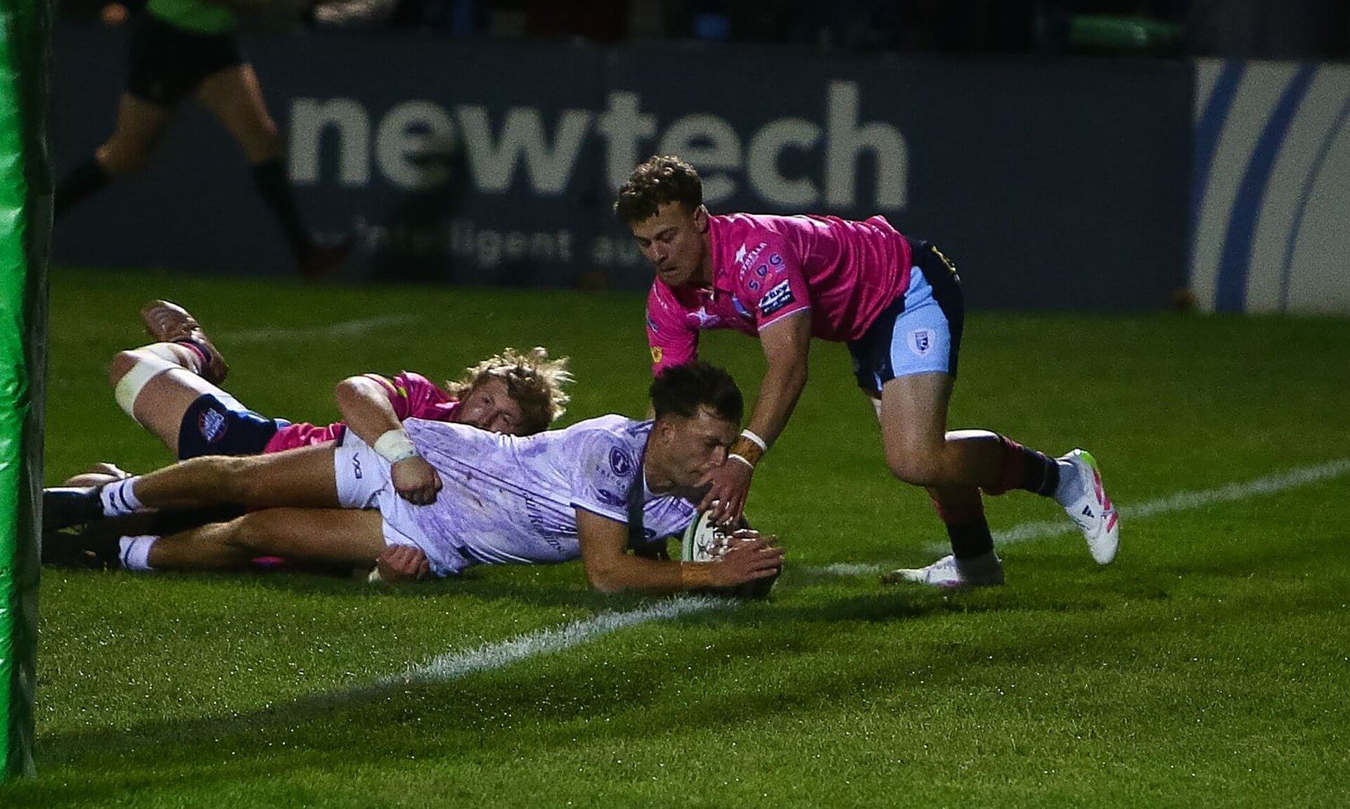 Cornish Pirates wing Arthur Relton dives over to score against Bedford Blues