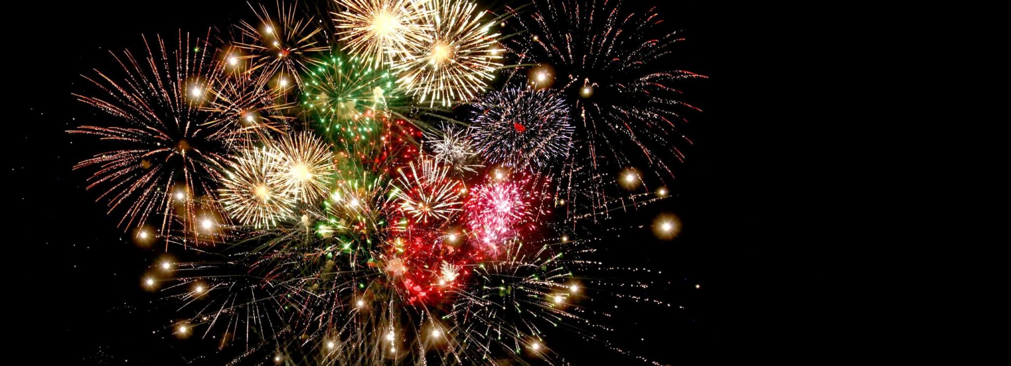 Colourful fireworks display against a black sky