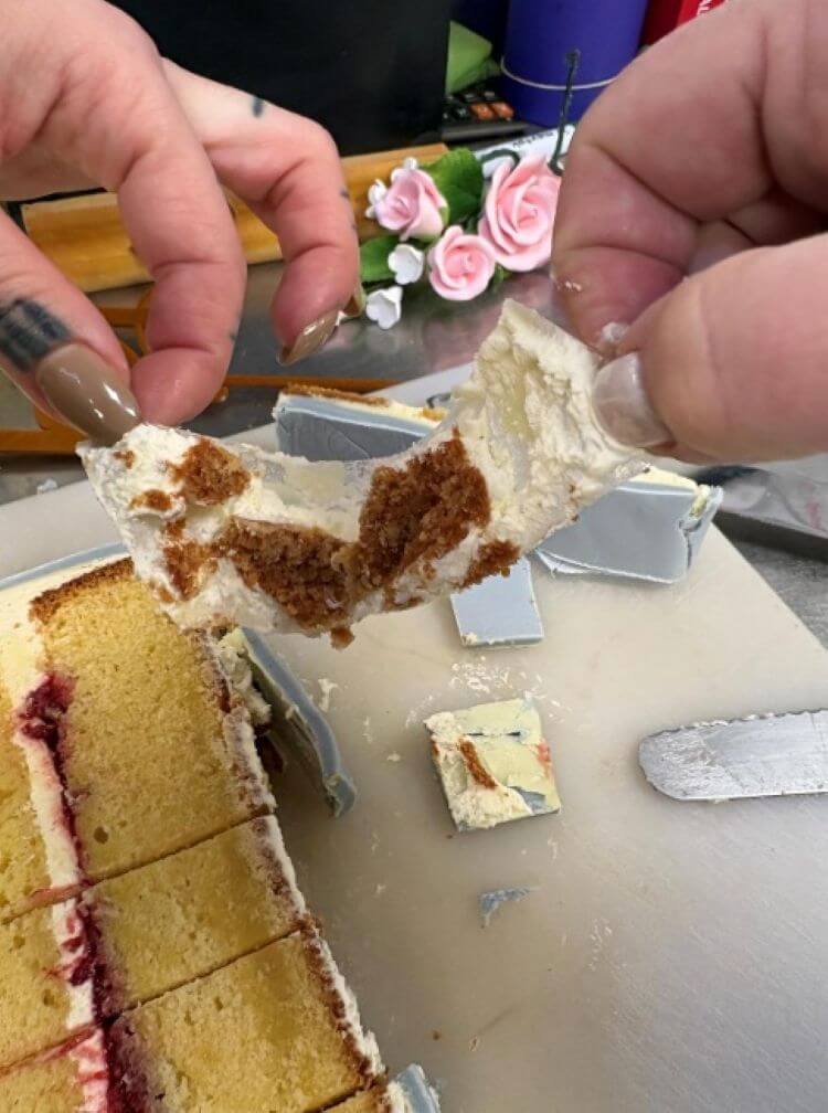 Plastic sheet pulled from between the icing layers of a wedding cake